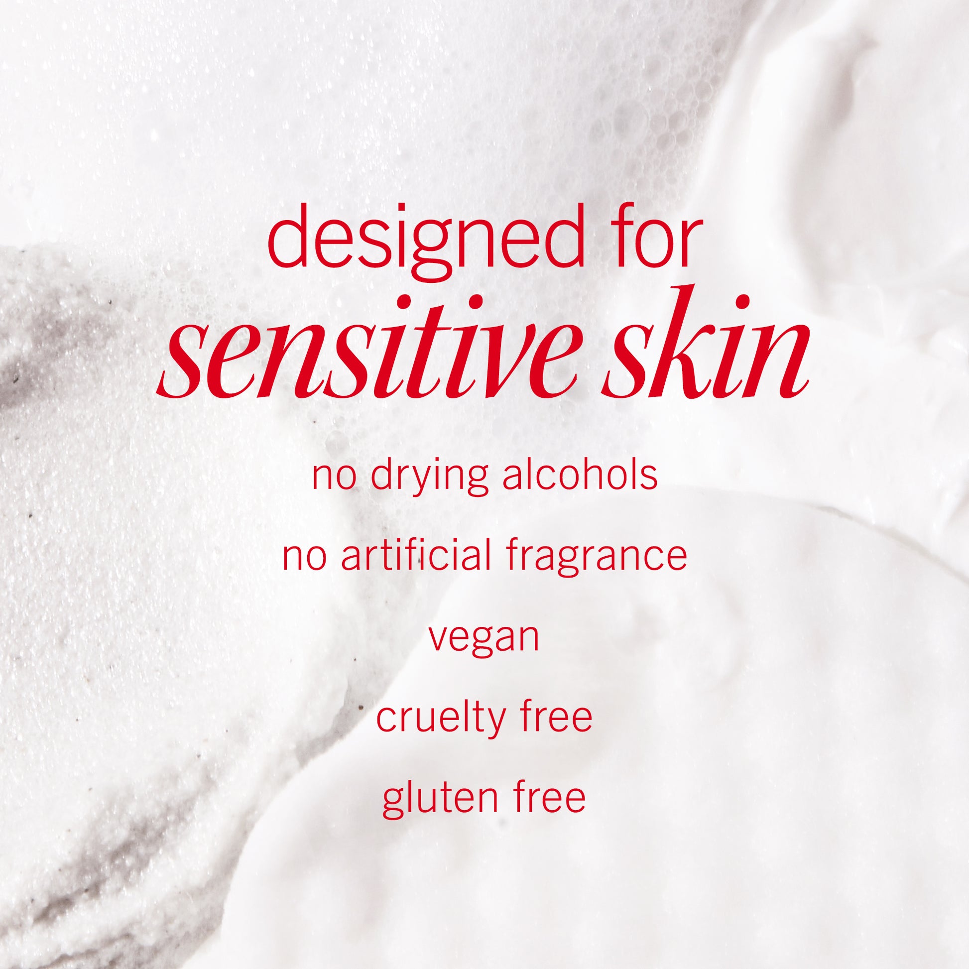 Foamy white texture fills the background, overlaid with red text stating: "designed for sensitive skin, no drying alcohols, no artificial fragrance, vegan, cruelty free, gluten free.
