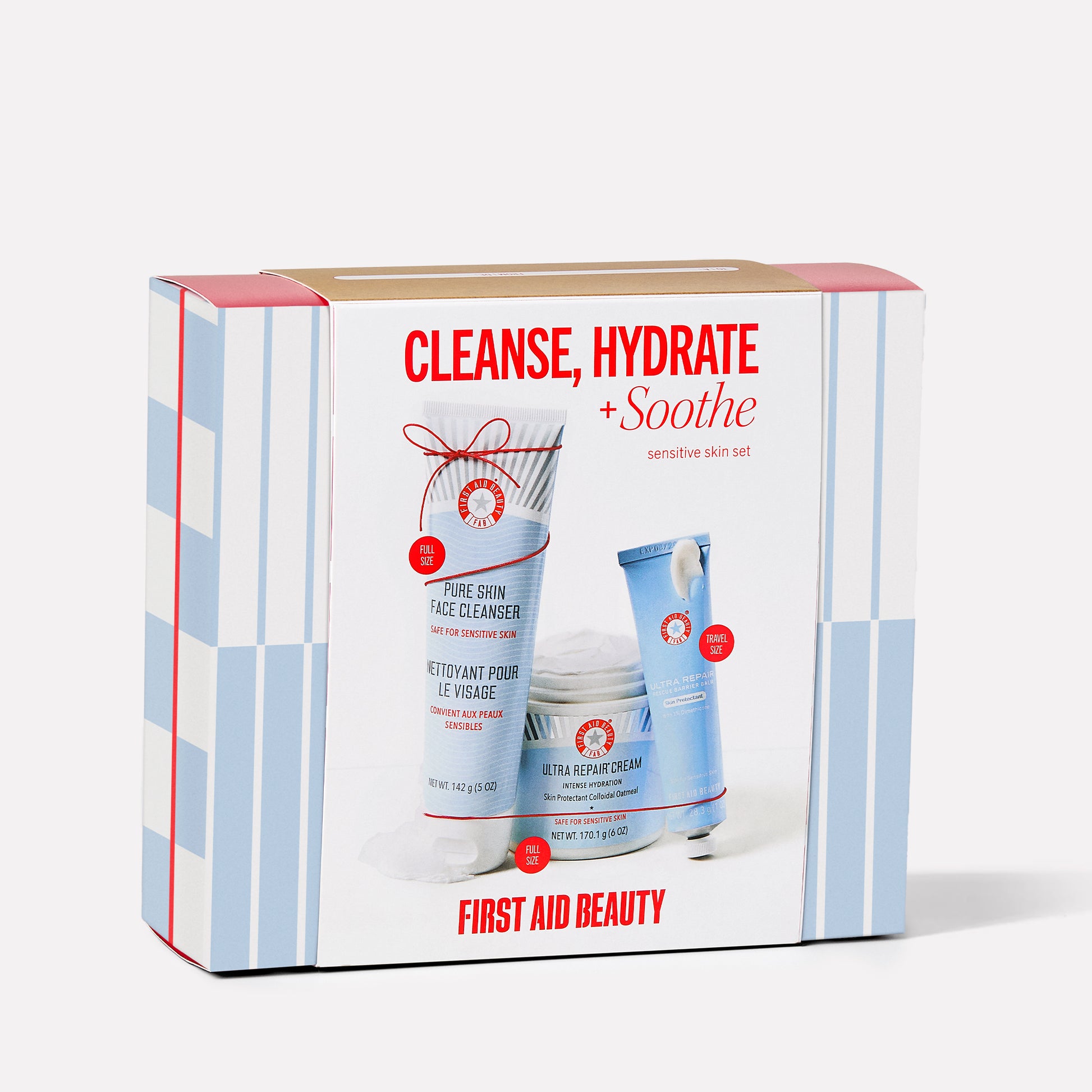 A skincare set labeled "Cleanse, Hydrate + Soothe" contains Pure Skin Face Cleanser and Ultra Repair Cream by First Aid Beauty. It’s designed for sensitive skin and includes full and travel sizes.