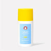 A white bottle with a yellow cap, labeled "First Aid Beauty Ultra Light Mineral Sunscreen SPF 30," contains text: "With Zinc Oxide, Broad Spectrum, Safe for Sensitive Skin, 44 mL (1.5 FL OZ)," against a plain background.