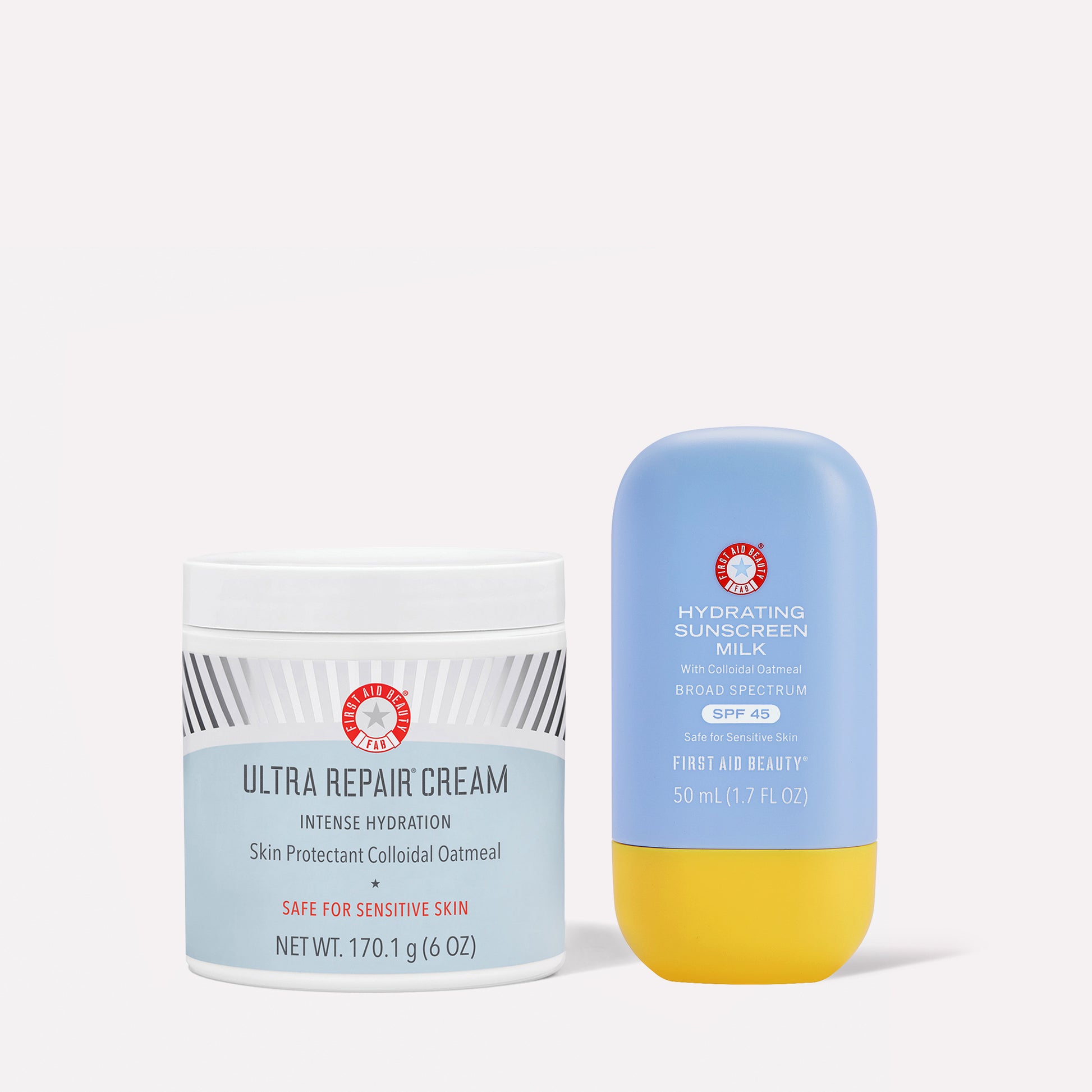 Container of "Ultra Repair Cream," intense hydration formula with colloidal oatmeal for sensitive skin, beside a bottle of "Hydrating Sunscreen Milk" SPF 45. Both are by First Aid Beauty.