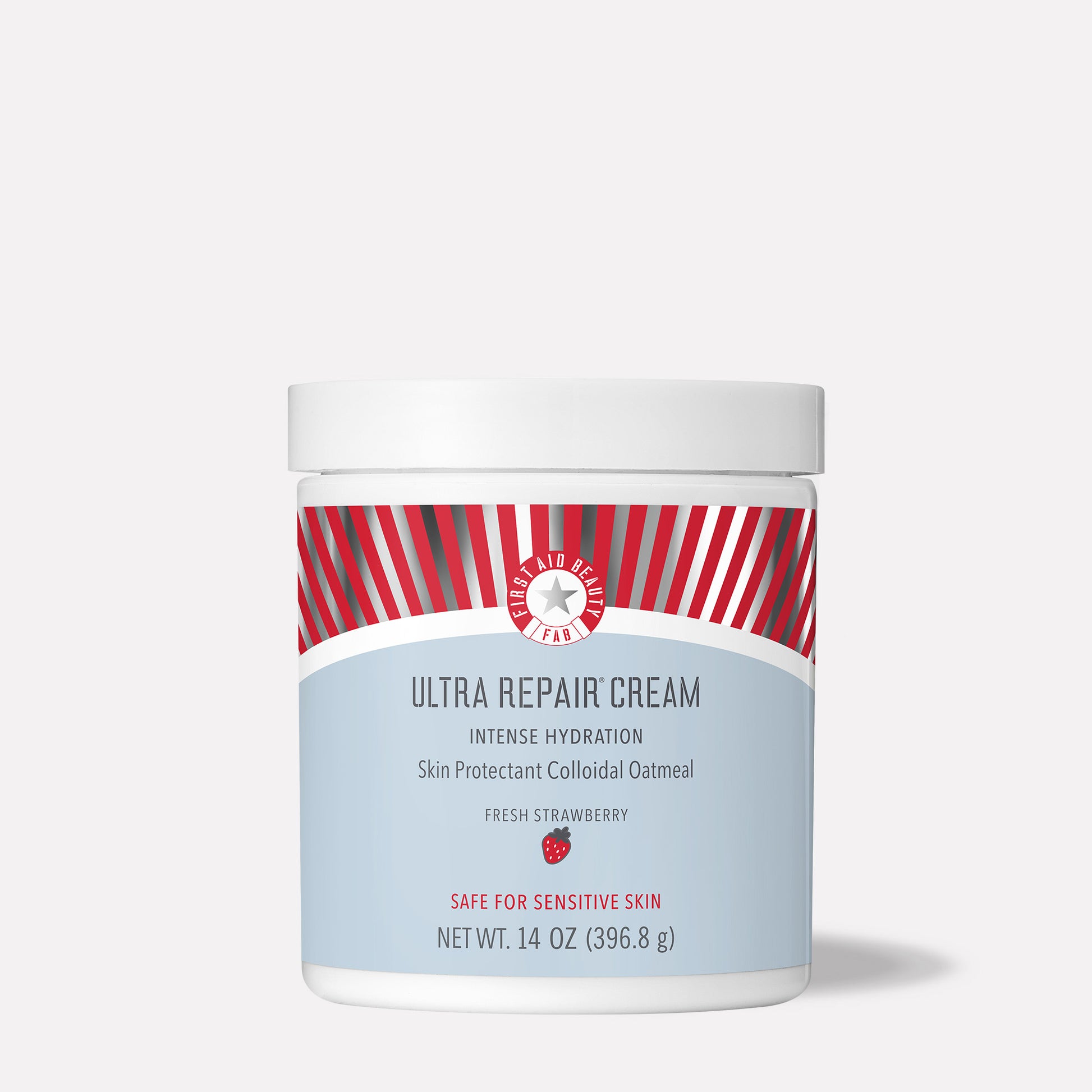 A white jar labeled "Ultra Repair Cream" features red-striped branding and text: "Intense Hydration, Skin Protectant Colloidal Oatmeal, Fresh Strawberry, Safe for Sensitive Skin, Net Wt. 14 oz (396.8 g)."